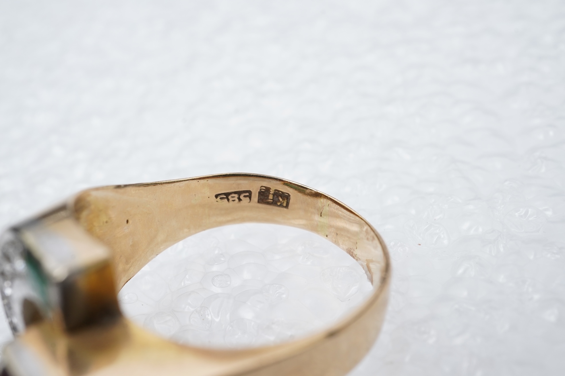 A ruby, emerald and diamond ring, mid 20th century